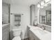 Bright bathroom featuring modern fixtures, gray backsplash and a sleek vanity at 7400 Sun Island Drive S # 712, South Pasadena, FL 33707