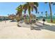 Outdoor grilling area with tiki huts, perfect for social gatherings at 7400 Sun Island Drive S # 712, South Pasadena, FL 33707