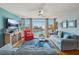 Well lit living room featuring a great view, stylish furniture, and hardwood floors at 7400 Sun Island Drive S # 712, South Pasadena, FL 33707