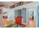 Stylish living space showcasing hardwood floors and access to the kitchen and another room at 7400 Sun Island Drive S # 712, South Pasadena, FL 33707