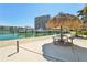 Picturesque marina featuring a tiki hut with seating overlooking boats and waterfront condos at 7400 Sun Island Drive S # 712, South Pasadena, FL 33707