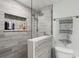 Contemporary shower features a recessed shelf and a modern shower head at 7400 Sun Island Drive S # 712, South Pasadena, FL 33707