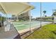 Enjoy the outdoors on the community shuffleboard courts with seating and sun shade at 7400 Sun Island Drive S # 712, South Pasadena, FL 33707