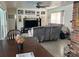 Inviting living room featuring a ceiling fan, neutral walls, and comfortable seating near dining area at 7430 17Th N Way, St Petersburg, FL 33702