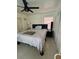Main bedroom featuring neutral tones, a ceiling fan, and a cozy atmosphere at 7430 17Th N Way, St Petersburg, FL 33702