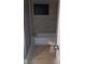 Bathroom featuring tile flooring, and a shower with tile surround at 10367 Councils Way, Temple Terrace, FL 33617