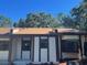 Charming home featuring neutral paint, dark brown trim, and a new roof at 10367 Councils Way, Temple Terrace, FL 33617