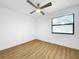 Clean bedroom with wood flooring and plenty of light at 10408 Rosemount Dr, Tampa, FL 33624