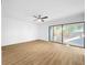 Bright living room featuring modern furniture, stylish decor, and an open layout that seamlessly flows to the outdoors at 10408 Rosemount Dr, Tampa, FL 33624