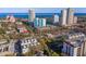 Aerial view showcasing the condominium's location within the city, complete with ocean views and nearby cityscape at 105 4Th Ne Ave # 218, St Petersburg, FL 33701