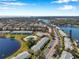 Stunning aerial view of waterfront community with a community pool and beautiful landscaping at 108 Pompano Se Dr # A, St Petersburg, FL 33705