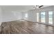 Bright and open living room featuring stylish flooring and access to the outdoor space at 108 Pompano Se Dr # A, St Petersburg, FL 33705