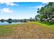 Scenic view of a tranquil pond with lush green surroundings at 108 Pompano Se Dr # A, St Petersburg, FL 33705