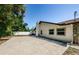 Back exterior featuring a concrete patio and view of the house at 1113 Carlton Rd, Tarpon Springs, FL 34689