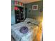 Tranquil bedroom featuring a comfortable bed, ample natural light, and closet at 122 Pompano Se Dr # A, St Petersburg, FL 33705
