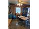 Cozy dining area featuring unique furnishings, and natural light at 122 Pompano Se Dr # A, St Petersburg, FL 33705