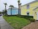 Colorful townhouses with well-manicured lawns, creating a welcoming curb appeal at 122 Pompano Se Dr # A, St Petersburg, FL 33705