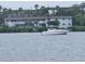 Picturesque water view featuring a boat and nearby building at 122 Pompano Se Dr # A, St Petersburg, FL 33705