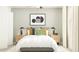 Comfortable bedroom with a king-size bed, stylish bedside tables, and natural lighting, perfect for relaxation at 12621 Aura Moonlight Ter, Parrish, FL 34219