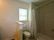 Bathroom featuring walk-in shower with white and gray tile at 14352 Editors Note St, Ruskin, FL 33573