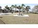Relax in the picnic area with table under shady trees in this well-maintained outdoor space at 14352 Editors Note St, Ruskin, FL 33573
