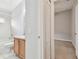 A traditional bathroom with vanity, sink, toilet and shower/tub combo at 15807 Leatherleaf Ln, Land O Lakes, FL 34638