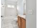 Bathroom showcasing the toilet, vanity, and shower/tub combo at 15807 Leatherleaf Ln, Land O Lakes, FL 34638