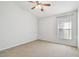 The bedroom includes a ceiling fan and a window at 15807 Leatherleaf Ln, Land O Lakes, FL 34638