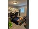 room with a bunk bed, window, and bright decorations at 16240 Lake Palm Dr, Lutz, FL 33549