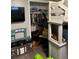 Playful bedroom with a closet, toy kitchen, and unique bunk bed structure at 16240 Lake Palm Dr, Lutz, FL 33549