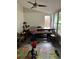 Sunroom with a ceiling fan at 16240 Lake Palm Dr, Lutz, FL 33549