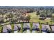 Stunning aerial view of home next to lush golf course and green landscape at 17749 Garsalaso Cir, Brooksville, FL 34604
