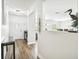 Welcoming foyer with wood-look floors and views into the living areas at 1805 Parkwood Dr, Valrico, FL 33594