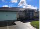 Charming single-story home with a well-manicured lawn and inviting curb appeal at 28 Sportsman Pl, Rotonda West, FL 33947