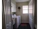Practical laundry room featuring a washer, dryer, and storage at 28 Sportsman Pl, Rotonda West, FL 33947