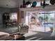 Open-concept living space with pool view, blending indoor comfort with outdoor beauty at 28 Sportsman Pl, Rotonda West, FL 33947