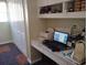 Functional office space with a built-in desk and ample storage at 28 Sportsman Pl, Rotonda West, FL 33947