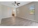 Bright bedroom with wood floors and large windows at 3031 Downan Point Dr, Land O Lakes, FL 34638