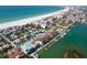 Beautiful aerial view of the coastal community with beach access and marina, near the famous Don CeSar Hotel at 3111 Pass A Grille Way # 213, St Pete Beach, FL 33706