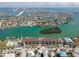 Expansive aerial view of a waterfront community offering stunning views of the bay and nearby attractions at 3111 Pass A Grille Way # 213, St Pete Beach, FL 33706