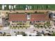 Aerial view of property showing proximity to water, parking, and outdoor amenities in a waterfront community at 3111 Pass A Grille Way # 213, St Pete Beach, FL 33706