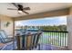 Relaxing balcony with comfortable seating and a beautiful water view at 3111 Pass A Grille Way # 213, St Pete Beach, FL 33706