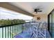 Inviting balcony with outdoor furniture and scenic views at 3111 Pass A Grille Way # 213, St Pete Beach, FL 33706