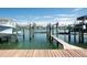 Private boat dock with lift and direct water access at 3111 Pass A Grille Way # 213, St Pete Beach, FL 33706