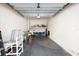 Spacious garage with storage shelves, bikes and beach chairs at 3111 Pass A Grille Way # 213, St Pete Beach, FL 33706