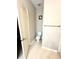 Compact bathroom design featuring a toilet, towel bar, and neutral walls for a clean look at 3128 Bayshore Oaks Dr, Tampa, FL 33611