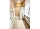 Bright bathroom showcasing a bathtub with shower, tile surround, and vanity with sink at 3128 Bayshore Oaks Dr, Tampa, FL 33611