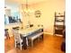 Bright dining room featuring hardwood floors and stylish lighting, perfect for entertaining guests at 3128 Bayshore Oaks Dr, Tampa, FL 33611