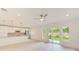 Open concept kitchen with new appliances and easy access to the outdoors at 316 Barbara Cir, Belleair, FL 33756