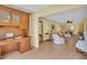 Living Room that views into Den and Dining Room at 3401 Stonehaven E Ct # A, Palm Harbor, FL 34684
